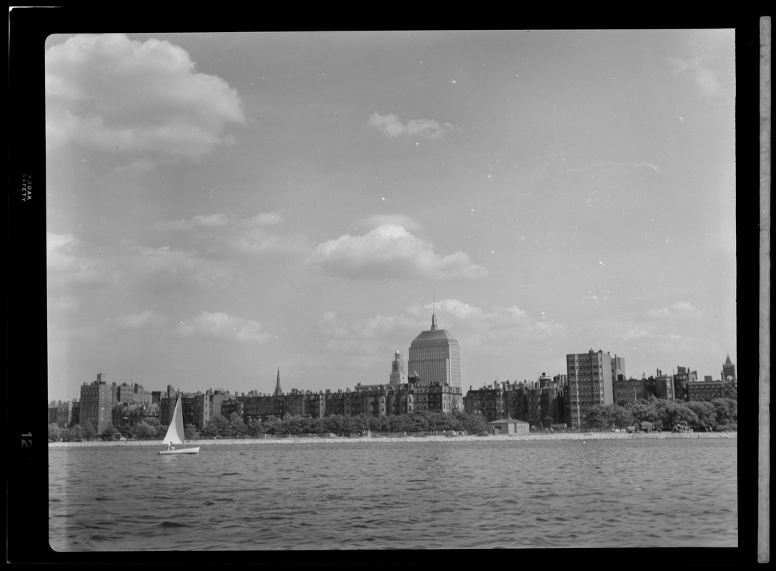 Sailboat on Charles River, with view of Back Bay, Boston