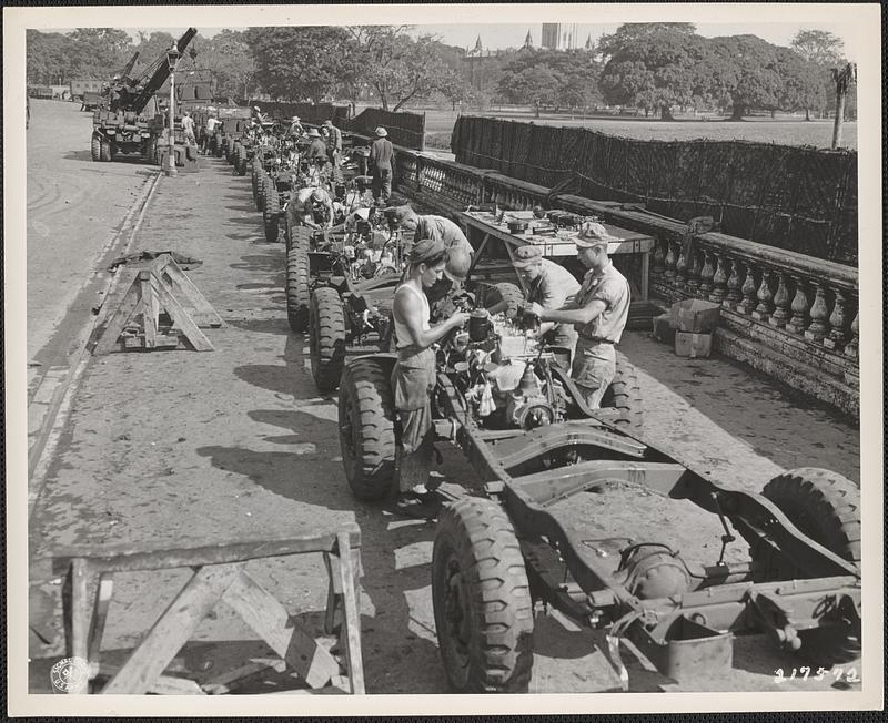 In Calcutta, India, GIs prepare the assembly line of the three-fourth ton weapons carrier