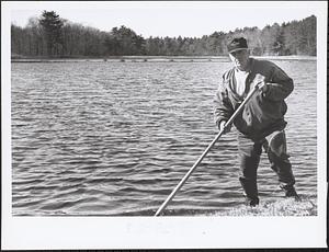 Charlie Northrup, working at Paradise Meadow cranberry bog on South Main Street