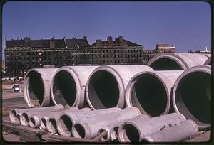 Construction pipes, Mercantile Wharf building in background