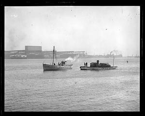 Police Boat Watchman next to an unidentified boat