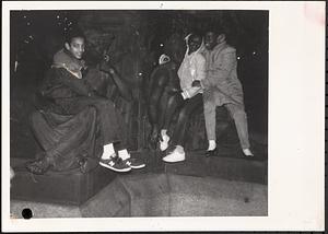 Young people sitting on Brewer Fountain in the Boston Common