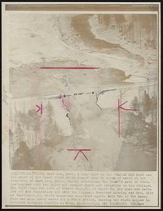 East Lee, Mass. A huge hole in the dam at Mud Pond was the cause of the flash flood which dumped over 20 acres of water on the community of East Lee, Mass., Sunday afternoon. The flood's path of destruction was over two miles and damaged homes and industies in the village. The flood took the life of Edward Gage, 60, of Route 20. His home was carried off its foundation and over the highway. Reported missing was Mrs. Olive Courtinier, 55, who's house was also torn apart. Exit Two of the Mass. Pike was also under water for a brief period, causing the state police to redirect turnpike traffic to West. Stockbridge.