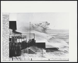 Hyannis Port, Mass. - Heavy Surf Pounds Cape Cod - Gale force winds whip surf pounding shore around the Kennedy compound at Hyannis Port, on Massachusetts Cape Cod this morning. Winds 50-miles an-hour slashed the coast forcing some of the residents along the shore to evacuate their homes at high tide. The late President Kennedy's home in the compound was not threatened.