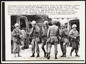 National Guard in Santa Barbara -- Riflemen of a National Guard unit assemble on a street in the city of Santa Barbara, Calif., today after Gov. Ronald Reagan declared a state of emergency in connection with riots at the University of California Santa Barbara campus. The suburban campus is about a dozen miles from where the troops assembled.