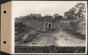 Contract No. 99, Enlargement of Fells High Level Distribution Reservoir, Stoneham, Malden, Melrose, dam 10 and gate structure looking south from 100 feet left of Sta. 1+00, enlargement of Fells Reservoir, Stoneham, Mass., Aug. 13, 1940