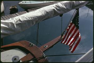 Closeup of a flag hanging from a boat