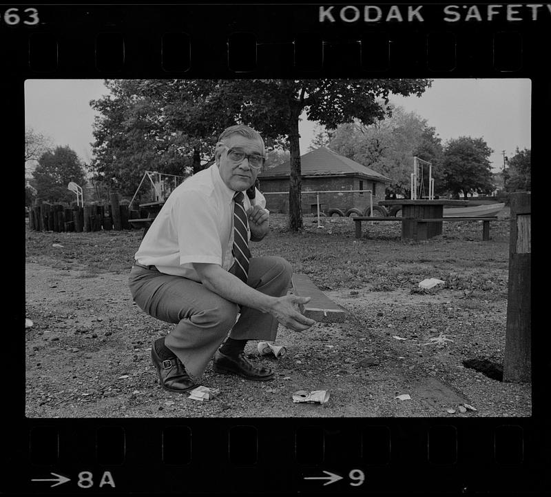 Peter Matthews at playground with litter