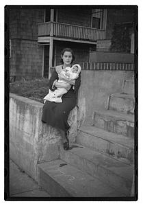Mercedes Pasarell Sanromá holding a baby