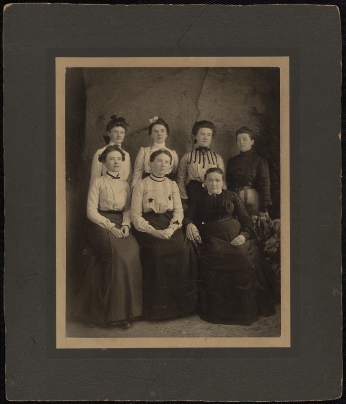 Seven women posed for a portrait