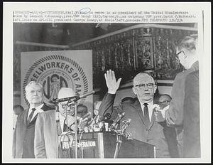 I.W. Abel is sworn in as president of the United Steelworkers union by Leonard R. Kennedy, pres. USW Local 1123, Canton, O., as outgoing USW pres. David J. McDonald, left, looks on. AFL-CIO president George Meany, at Abels' left, ponders.