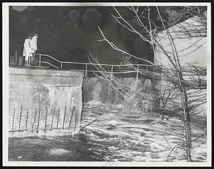 Easton, Mass. Flyaway Pond dam split open by flood