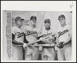 Gunning for Third Straight -- Twins Tony Oliva, Don Mincher, Earl Battey and Bob Allison (left to right) pose yesterday at Dodger Stadium during workout. They're gunning for three straight over the Dodgers in World Series resuming today.