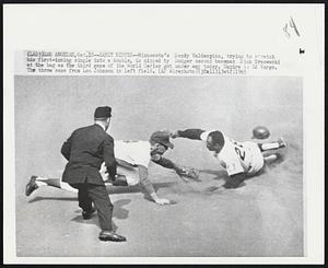 Los Angeles – Sandy Nipped – Minnesota’s Sandyy Valdespino, trying to stretch his first-inning single into a double, is nipped by Dodger second baseman Dick Tracewski at the bag as the third game of the World Series got under way today. Umpire is Ed Vargo. The throw came from Lou Johnson in left field.