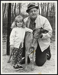 Michelle Henshaw, with grandfather Otto Mamino and greyhound Dale Commel