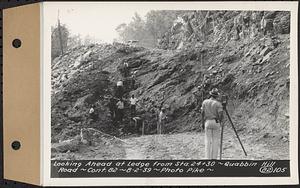 Contract No. 82, Constructing Quabbin Hill Road, Ware, looking ahead at ledge from Sta. 24+30, Ware, Mass., Aug. 2, 1939