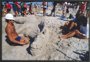 Ipswich, MA (circa 1982): Sand sculptures being made on Crane Beach