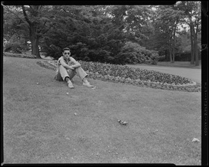 Albert Arzouhaljian at Forest Hills Cemetery, sitting on the lawn