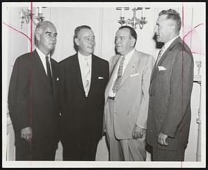 Lincoln-Mercury Officials attending sales meeting yesterday in Boston included, left to right, Paul Davis, A. H. Crowley, Joseph Lewis and Joseph F. Abely, New England manager of Lincoln-Mercury.