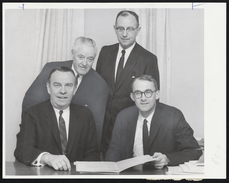 From Left, front, Dr. Leo Donahue, school's supt.; Dr. William Ackerly