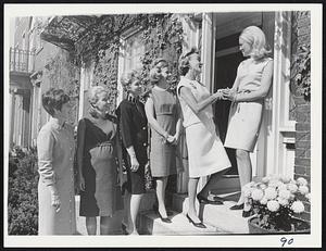 Welcoming the Wives of Democratic candidates for a coffee hour, held yesterday at her Charles River Square home, is Mrs. Edward M. Kennedy. Left to right, Mrs. Robert Q. Crane; Mrs. Kevin H. White; Mrs. Francis X. Bellotti; Mrs. Edward J. McCormack Jr. and Mrs. Endicott Peabody.