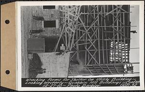 Contract No. 107, Quabbin Hill Recreation Buildings and Road, Ware, wrecking forms for shelter on utility building, looking westerly, Ware, Mass., Dec. 27, 1940