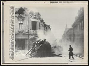 Dome Doomed in Yugoslav Quake--A civilian stops short and sees the dome of a house fall at his feet in a cloud of dust Monday after Banja Luka, Yugoslavia, was hit by its second earthquake in as many days.