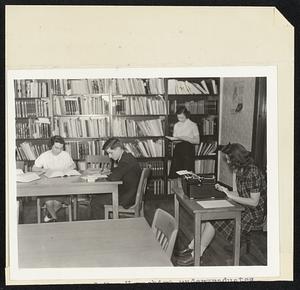 University of New Hampshire undergraduates find an opportunity to put their social science study into practice through work in the recently established bureau of government research. The bureau conducts governmental surveys upon the request of agencies, makes special studies, and directs instructional phases, among them internships and off-campus in-service  training classes. Shown working in the bureau's new 2000 volume library are Margaret Rhome of Lancaster, Neal Westfall of Rye, Edith Blake of Pike, and Mary Hayner of Laconia.
