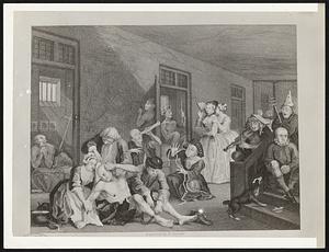 An interior of an 18th century madhouse as depicted by Hogarth, the famous English engraver, in his series of etchings called "The Rake's Progress."