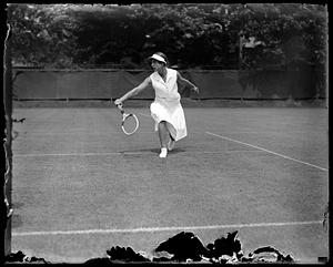 Helen Wills playing tennis