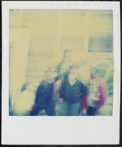 Group of four by the metal railing