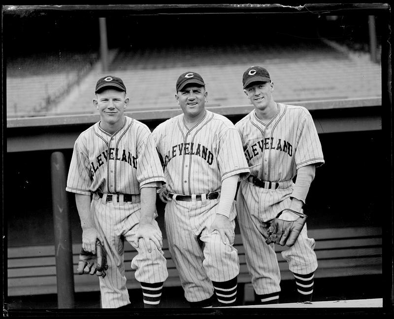 Three Cleveland Indians in the dugout