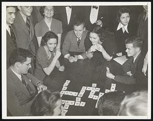 Harvard Conquers Wellesley. Feminine Wiles Almost--But Not Quite--Won the day Feb. 17 when Harvard students met Wellesley in a crossword spelling game at Cambridge, Mass. The Crimson Warriors won, two sets to one, but not before they had had such words as “chum” and “bum” hurled at them. Here’s a tense moment as Ed Reid (at left, wearing glasses) ponders a play. Other contestants shown are (left to right): Frances Nearing, Robert Bunker, Adrian Thorne and William R. Calbee.