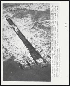 Padre Island Pier Pounded--The Bob Hall Pier, in the county park on Padre Island was broken in many places by the pounding waves caused by hurricane Carla as it approached the Texas coast. The pier w as totally demolished by the pounding waves after this picture was taken.