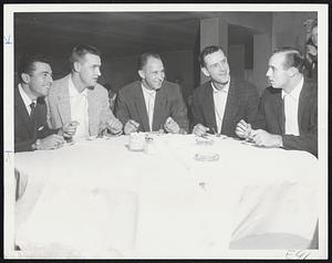 Senators in Session at the Hotel Kenmore today as the Washington Senators meet the Rex Sox tonight at Fenway Park. The man in the center is Roy Sievers, whom the Red Sox would like to get from Washington. Sievers is back in stride after being injured. The other are former Red Sox athletes, although Albie Pearson (left) never did get to the varsity, being traded before spring training began. The others are pitcher Jack Spring (next to Pearson), Norm Zauchin, second right, and Faye Throneberry.