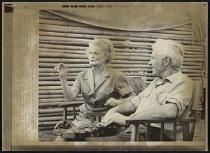 Settings the Scene--Author Joy Adamson, foster mother of Elsa the Lioness and Pippa, a cheetah, tells British producer-director Kenneth Talbot where the props should be stationed during the filming of a documentary of her years with Pippa at Lake Naivasha in Kenya.