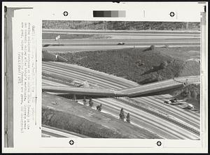 This is the Red printer showing collapsed overpass on the Golden State freeway in the San Fernando valley after today's earthquake. Concrete areas are gray, slopes separating freeways are green.