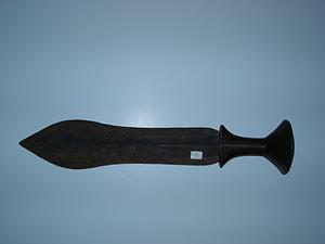 Knife with broad shaped blade