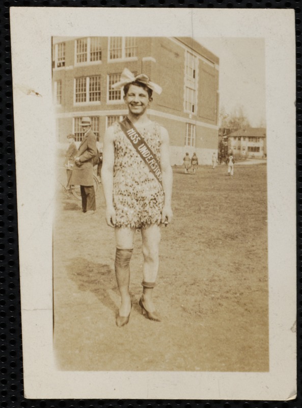 Male student in female drag, "Miss Understood"