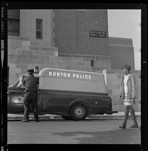 Boston Police wagon in front of Martin Luther King Jr. Middle School