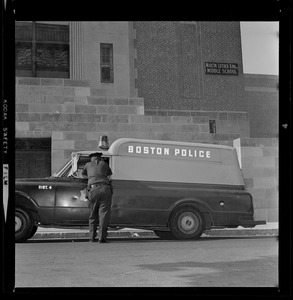 Boston Police wagon in front of Martin Luther King Jr. Middle School