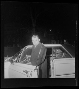 F. Lee Bailey, criminal defense attorney, entering a vehicle