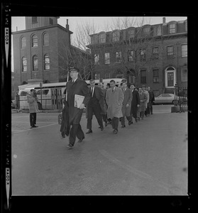 Jury for the DeSalvo trial walking across a parking lot