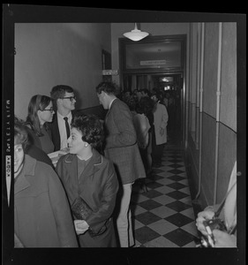Line forming the hallway of courthouse