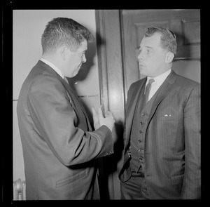 Assistant District Attorney Donald L. Conn, and criminal defense attorney, F. Lee Bailey in discussion