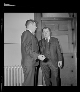 Assistant district attorney, Donald L. Conn, and criminal defense attorney, F. Lee Bailey in discussion