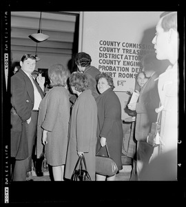 Group of people in the lobby of the courthouse