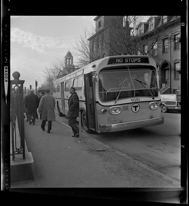 People exiting a bus