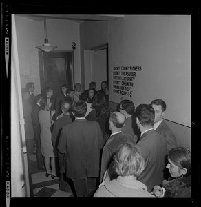 Group of people in the hallway of courthouse