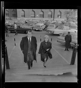 Attorney F. Lee Bailey and his wife walking up stairs